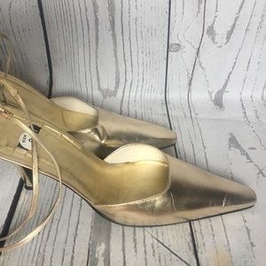 Metallic gold pointed toe heels